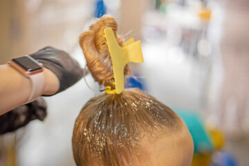 create a fashionable ponytail hairstyle for a ballroom dancing tournament. Non-Olympic sport