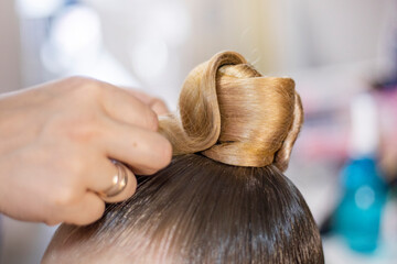 create a fashionable ponytail hairstyle for a ballroom dancing tournament. Non-Olympic sport