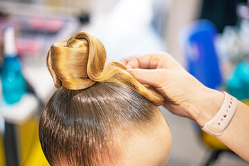 create a fashionable ponytail hairstyle for a ballroom dancing tournament. Non-Olympic sport