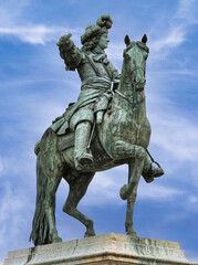Equestrian statue of Louis XIV (Versailles) located in the Cour d'Honneur (Marble Courtyard), depicts the king in Roman armor, riding a rearing horse