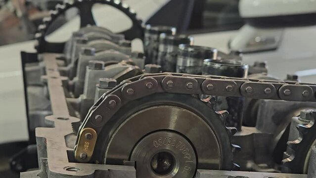 Car engine with chain drive timing mechanism