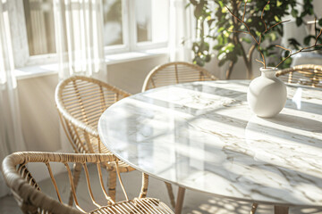 Bright dining area with a marble table and wicker chairs bathed in sunlight from large windows and a vase