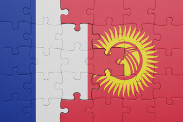 puzzle with the colourful national flag of kyrgyzstan and flag of france.