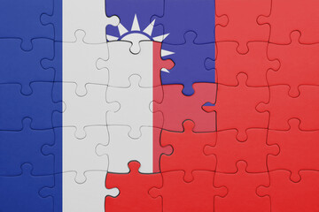 puzzle with the colourful national flag of taiwan and flag of france.