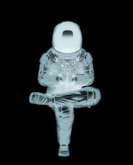 master astronaut is doing a namaste yoga pose