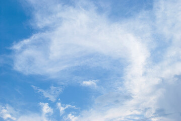 gentle clouds in the blue sky