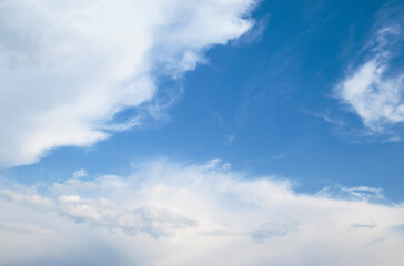 gentle clouds in the blue sky