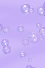 Cosmetic bubbles flying on purple background