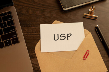 There is word card with the word USP. It is an abbreviation for Unique Selling Proposition as eye-catching image.