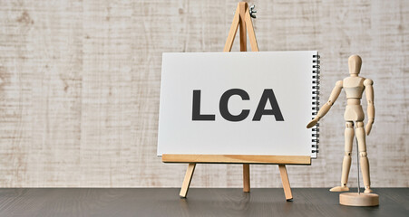 There is notebook with the word LCA. It is an abbreviation for Life Cycle Assessment as...