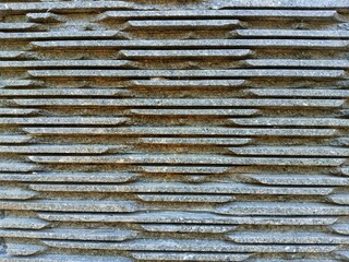 Stone wall texture with even stripes and blocks, for architectural, interior design, decoration, home, property, hospitality, etc.