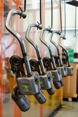 Mofles y exostos en linea de produccion