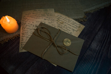 An antique envelope and a letter on the table