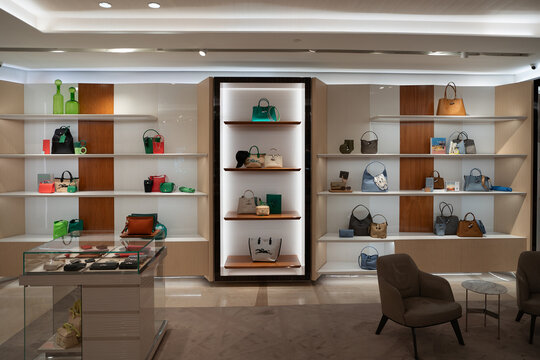 KUALA LUMPUR, MALAYSIA - MARCH 15, 2023: bags on display at Longchamp store inside Suria KLCC shopping mall in Kuala Lumpur. Longchamp is a French leather goods company.
