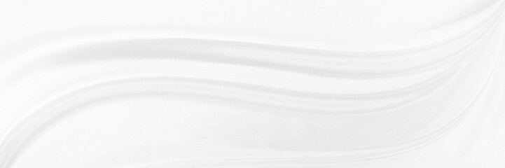 White gray satin texture that is white silver fabric silk panorama background with beautiful soft blur pattern natural.