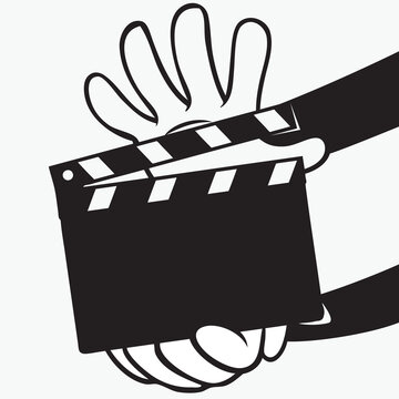 Movie clapperboard in hands