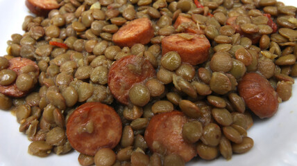 details of the meal. Lentils prepared with sausage. Lentils prepared for lunch.