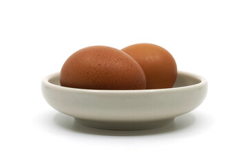 two eggs in a bowl