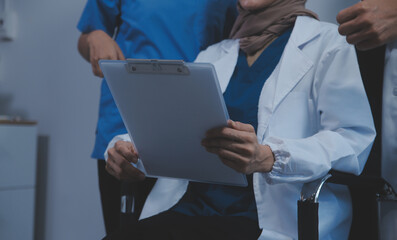Quality healthcare is all about putting the patient at the centre. Shot of a group of medical practitioners having a discussion in a hospital.