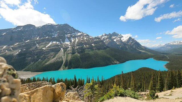 Peto lake Yoho national park in cloudy summer day sky. blue Emerald water lake reflected enormous mountains. Panoramic viewpoint of amazing scenery. Aerial view photography in nature landscape.