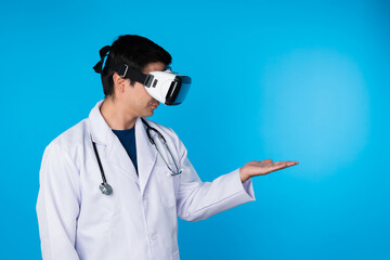 Smart doctor wearing VR headset looking to connect metaverse data holding analytical medicine...
