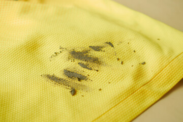 yellow dirty shirt, making stain