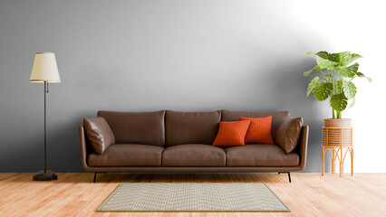 a brown couch sitting on top of a wooden floor