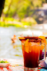 Refreshing Michelada by the Riverside