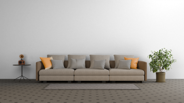 a couch with pillows and a plant in a room