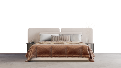 a bed with a brown comforter and pillows