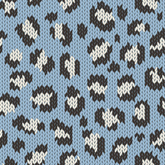 Knitted animal skin seamless pattern. Fabric imitation vector background. Flat style knit wallpaper with leopard print. Cute design for gift wrap, paper, textile