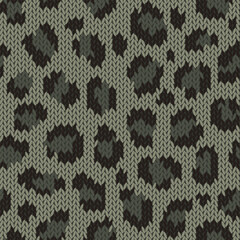 Knitted animal skin seamless pattern. Fabric imitation vector background. Flat style knit wallpaper with leopard print. Cute design for gift wrap, paper, textile