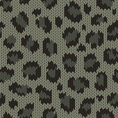 Knitted animal skin seamless pattern. Fabric imitation vector background. Flat style knit wallpaper with leopard print. Cute design for gift wrap, paper, textile
