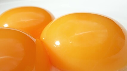 Close-up Marvel: In this mesmerizing macro, the yolk comes to life as a vibrant, golden sun. Its...