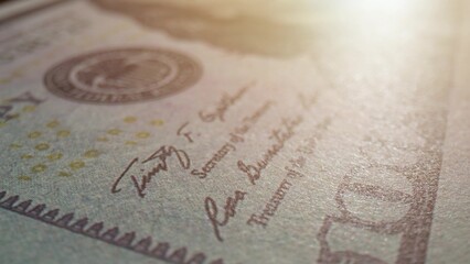 Explore intricate details on a 100 dollars bill in this close-up macro, revealing hidden...
