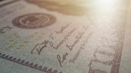 Explore intricate details on a 100 dollars bill in this close-up macro, revealing hidden intricacies of currency. Currency exchange and Financial stability concept. Banknotes Background. 
