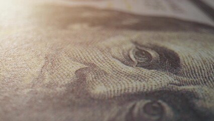 Captivating close-up macro of a one hundred dollars bill, revealing intricate details and textures. Sustainable financial products concept. Cash money Background. 
