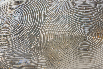 Circular shapes wire labyrinth metal texture pattern chrome