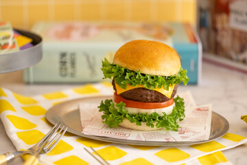 a beef burger with cheese