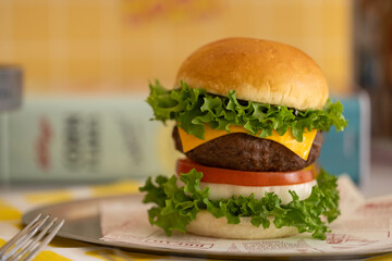 a beef burger with cheese
