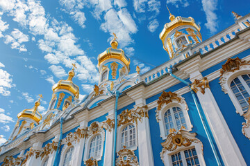 Catherine Palace in Russia with its ornate blue and white facade and golden domes