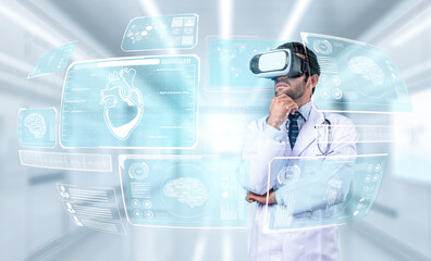 Professional doctor wearing lab coat and VR headset while looking at hologram of human organ....