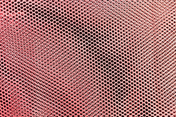 Red net on black fabric background, red net texture background