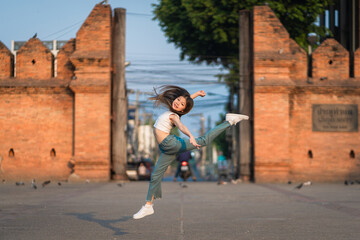 Beautiful girl ballerina dancing. Ballerina Performance Street Show in the morning at Tha Phae Gate...