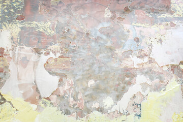 Fototapeta premium rich texture of an old old wall interesting pattern and grungy textured peeling paint and putty applied in layers at different times