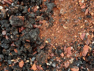 The background of waste from the burning of coal is brown. Texture of brown ash from burning coal. Industrial backgrounds and textures.