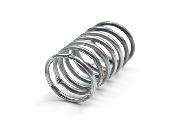 Miniature metal spring, isolated on white