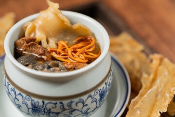 Cordyceps Flower with Stewed Silkie Chicken and Fish Maw