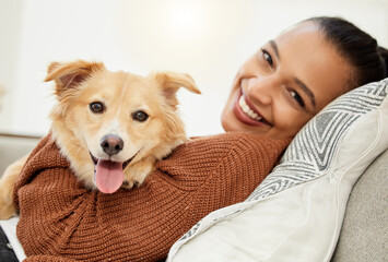 Portrait, dog and woman on sofa with love for happiness, relax and playing together for support....