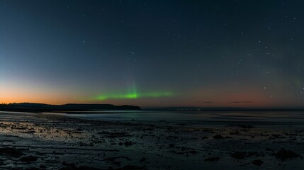 A brilliant flash of green on the horizon marks the transition from day to night.